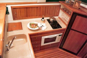 Even with a hot- and cold-water sink, a two-burner stove, a microwave oven and a refrigerator/freezer in the galley, there's ample counterspace for preparing meals.