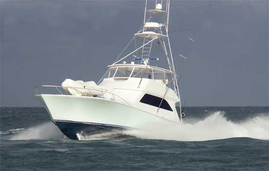 The design of a typical convertible with inboard power, running along bow high and kicking up a big wake, creates a great deal of form drag because of the deep furrow it plows in the water.