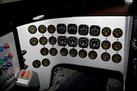 The top row of instruments consists of the top priority: exhaust temperature gauges.