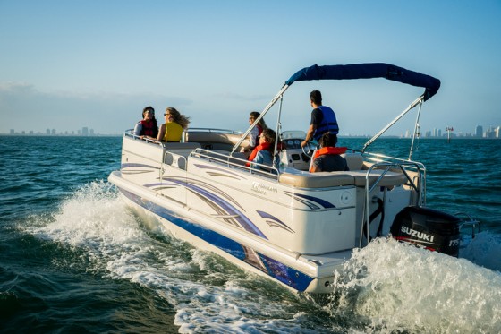 Build a pontoon boat out of fiberglass? Carolina Skiff says, why not?