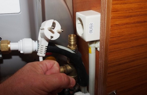 It's not so much the plugs and sockets that are a worry, but wiring originally sized for 230 volts will be only half the correct gauge for 115 volts in the U.S.