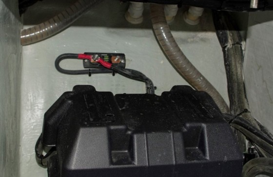 Chances are, this fuse blew when overloaded by the starter motor, and the crew simply put both cables on the same stud to complete the circuit and bypass the blown fuse.