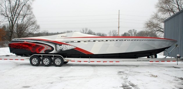 Powered by twin 725-hp Ilmor engines, this 42-foot Chief V-bottom recently painted by The Art of Design will find a warmer home outside the Miami Convention Center this month.