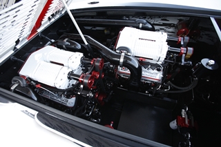 A collaboration between Teague Custom Marine and Whipple Industries, prototype 1,385-hp supercharged engines—matched to the boat’s color scheme—power the 43-footer.