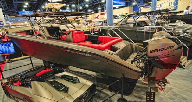 Not to be outdone by the pure go-fast boat builders, Midnight Express showcased a dazzling 39-foot center console with an equally dazzling—and color-matched—Lamborghini. Photo by <A HREF="http://naplesimage.com">Jay Nichols/Naples Image.</A>