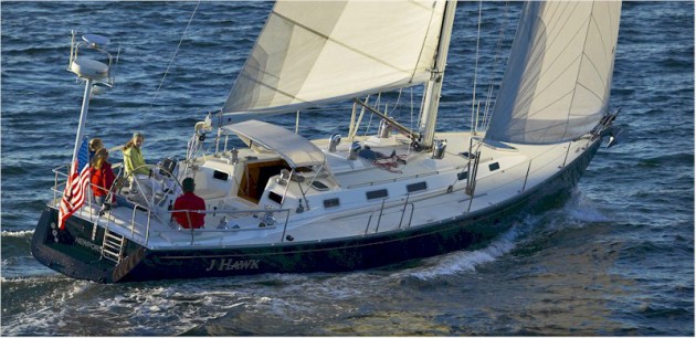 A J/44 powers away under sail. 