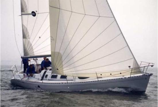 The Beneteau 38s5 under sail. 