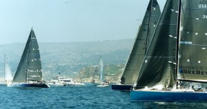 Philippe Kahn's Pegasus (left) leads Transpac's big boats across the starting line in only 3 knots of wind, followed by Bob McNulty's Chance (dark blue hull) and Jim Demetriades' Transpac 52 Yassou. Photo by Rich Roberts