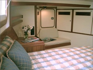 The forward stateroom has a "home-sized" island berth and abundant cabinetry.
