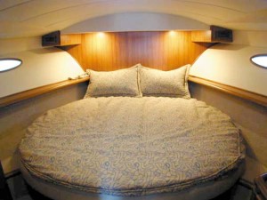 In the simple-yet-elegant master stateroom, there's a queen-size bed and plenty of space.