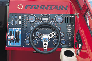 The helm station of the 35' Lightning boasted the classic Fountain horseshoe arrangement of gauges and left-hand throttle placement.