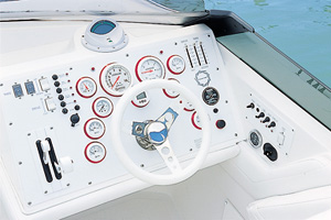 Arranged in a horseshoe pattern around the steering wheel at the helm were Gaffrig gauges, including a 100-mph liquid-filled speedometer, front and center.
