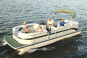 The 25 Legend Sport Dek handles like a hybrid between a pontoon boat and a deckboat.