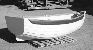 The Cherub, a 7-foot-4-inch fiberglass lapstrake rowing and sailing dinghy.