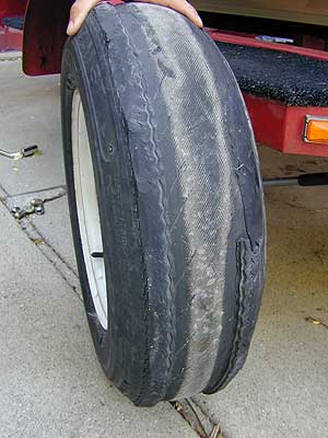 God bless BF Goodrich…the delaminated carcass of this boat trailer tire got its owner home in one piece.