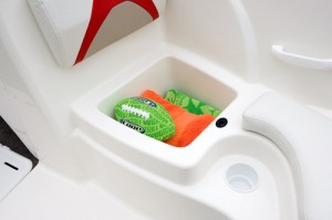 Bow seat cushions are secured with push-pin device, and the smooth, molded compartment can be used as a cooler.