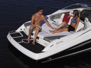 The bench seat on the Sea Ray 210 Select provides a great area to relax.