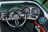 The starboard side gauges are out from behind the wheel.