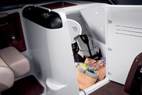 Add your own portable head to this large compartment in the port console, or just use it for gear stowage.