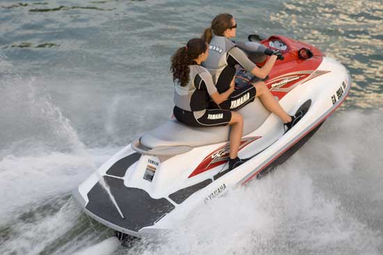 Longer, three-passenger seat and deeper, padded boarding platform are standard even on the entry-level VX Sport, shown here with optional mirrors.