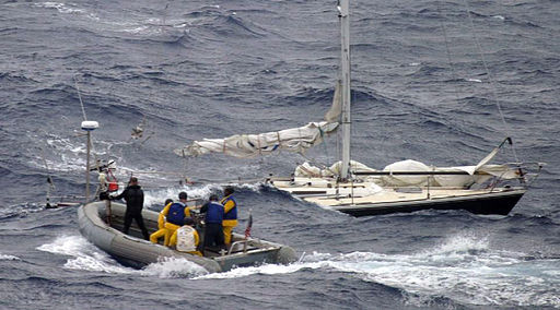 sinking sailboat rescued by US Navy