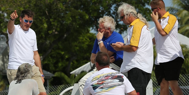 Said Curtis (in blue shirt): "Mike and I are both second-generation boat builders."
