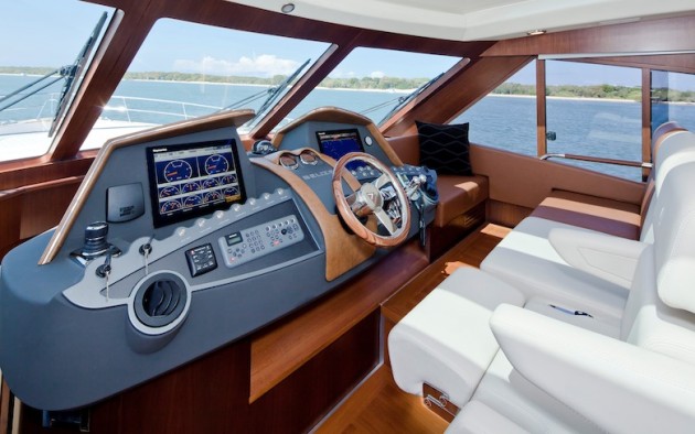 Space Shuttle? Nope, this is the lower helm on the Belize 54 Daybridge, replete with full Raymarine instrumentation, Zeuss joystick control, and Skyhook dynamic positioning panel. 
