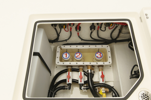 Cobia's clever pressurized livewell system, which is designed to keep your bait alive and kicking, lCobia's clever pressurized livewell system, which is designed to keep your bait alive and kicking, longer. Note the attention to detail in the way hoses and electrical wires are run. onger.
