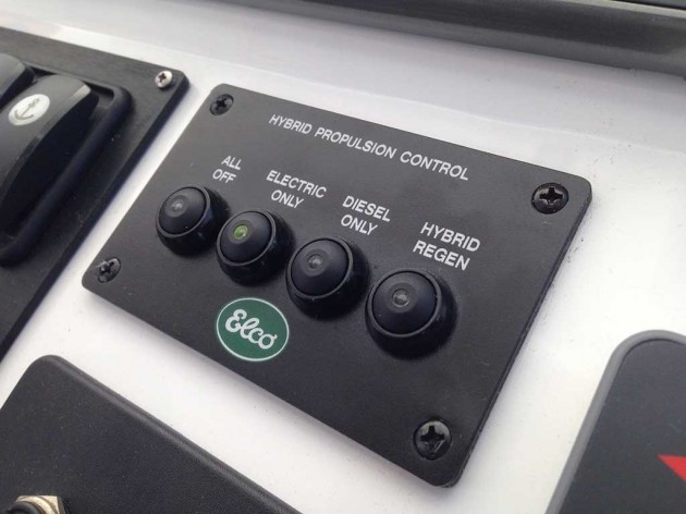 The only thing that gives away the hybrid status of the Swift Trawler 34 at the helm is this hybrid control panel.