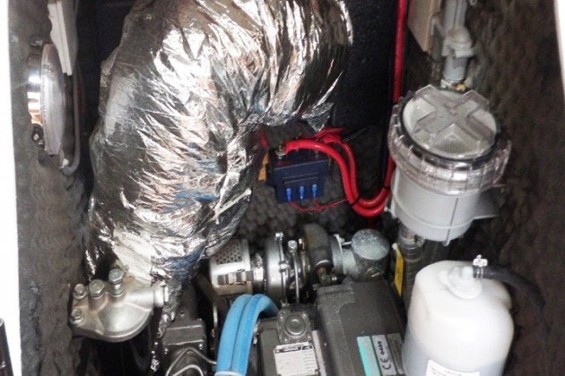 Here's a recipe for trouble: The insulation is in contact with the turbo below it, and the  battery isolator is mounted too close to the turbo and exhaust system.