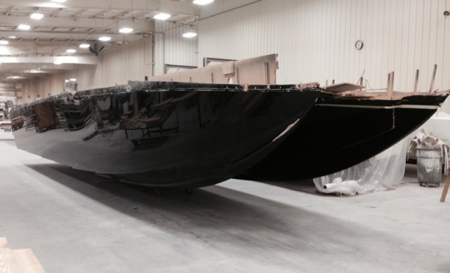 With the hull mold complete, lamination for the first Skater 428 catamaran is underway.