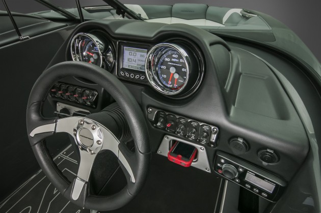 The Moomba Mojo 2.5's dash. Note the cruise control panel (center) and the ballast tank controls (lower right).