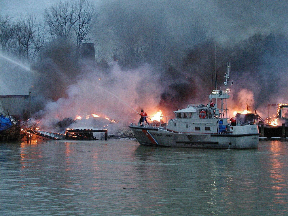 coast guard fighting boat  fire