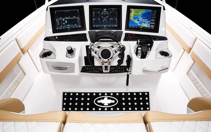 Goodies at the helm station include dual Garmin GPS units and Mercury Marine’s advanced Axius and SkyHook systems.