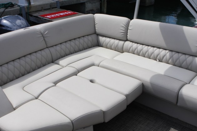 The huge "Club" lounge sits on the aft port quarter of the Bennington 30 Club Twin. Twister, anyone?