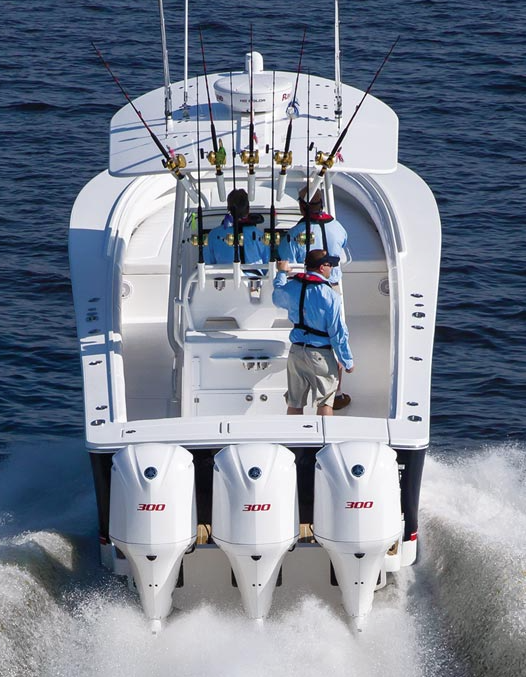 The boat isn't new, but the triple Yamaha outboard power is. Note the Carolina flare in the bow section. 