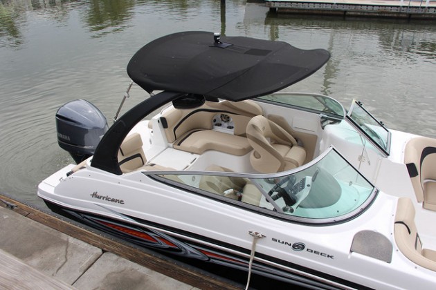 There's a lot to love about the Hurricane SunDeck SD 2486 OB's layout. The break in the aft seating area can be flipped up to form a U-shaped seating area and note the transom seating on the swim platform. Photo courtesy of Hurricane Boats