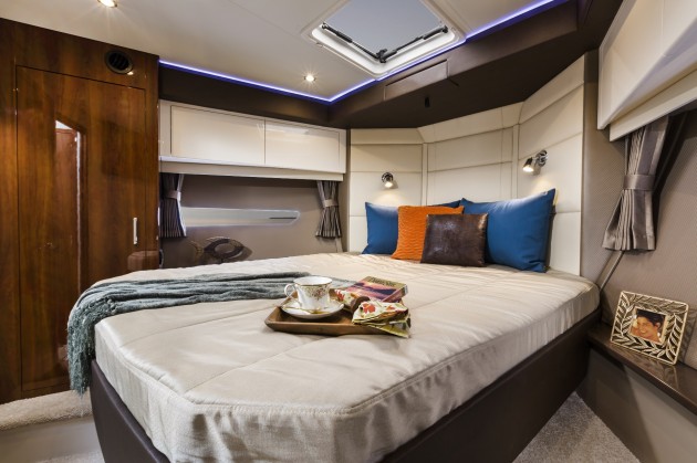 The island berth in the extremely roomy master stateroom. Photo courtesy of Carver