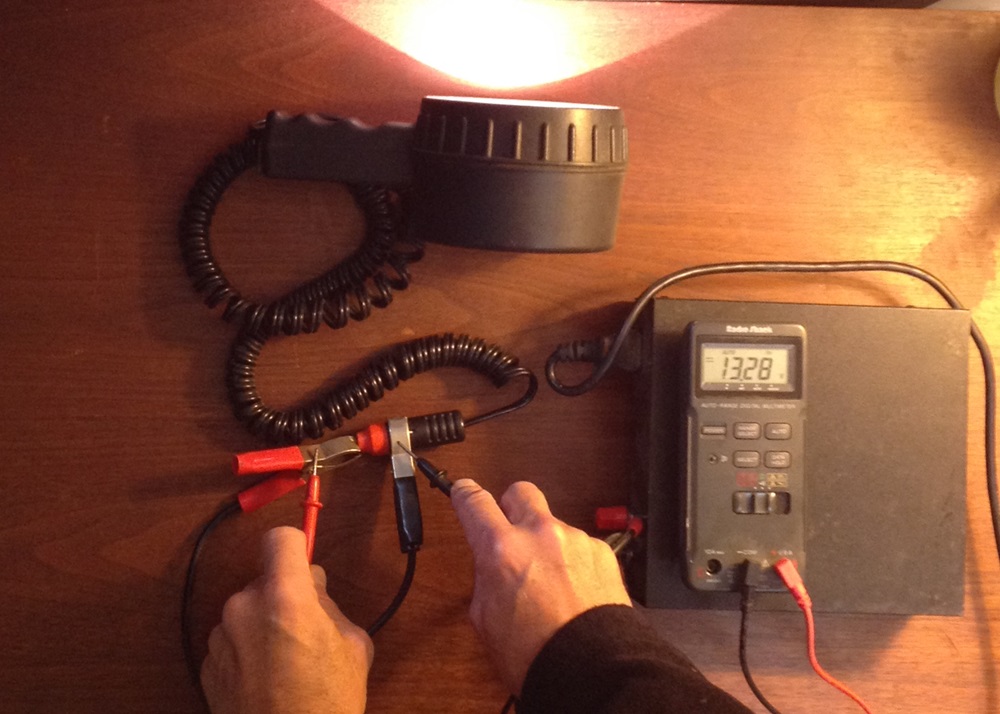 Fig. 3 - With the searchlight connected by adequate-sized wires and switched on, the circuit shows an acceptable 5% voltage drop, most caused by the light running normally.
