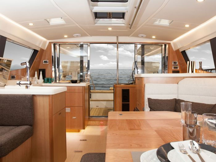 To starboard and aft in the Moody’s cabin is a galley with large Corian counters, twin sinks, a stove/oven combination, and a small dishwasher.