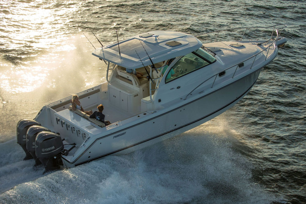 Modern powerboats come in all shapes and sizes, and may have several different types of engines. Read on, to find out why this Pursuit OS 385 is not just a powerboat, but is also a deep-V outboard planning walkaround boat—and to learn a whole lot more.