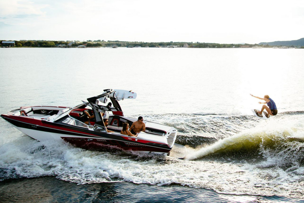 Though it’s smaller and less expensive than many dedicated watersports boats, the RZX3 is ready for some serious wake surfing action.